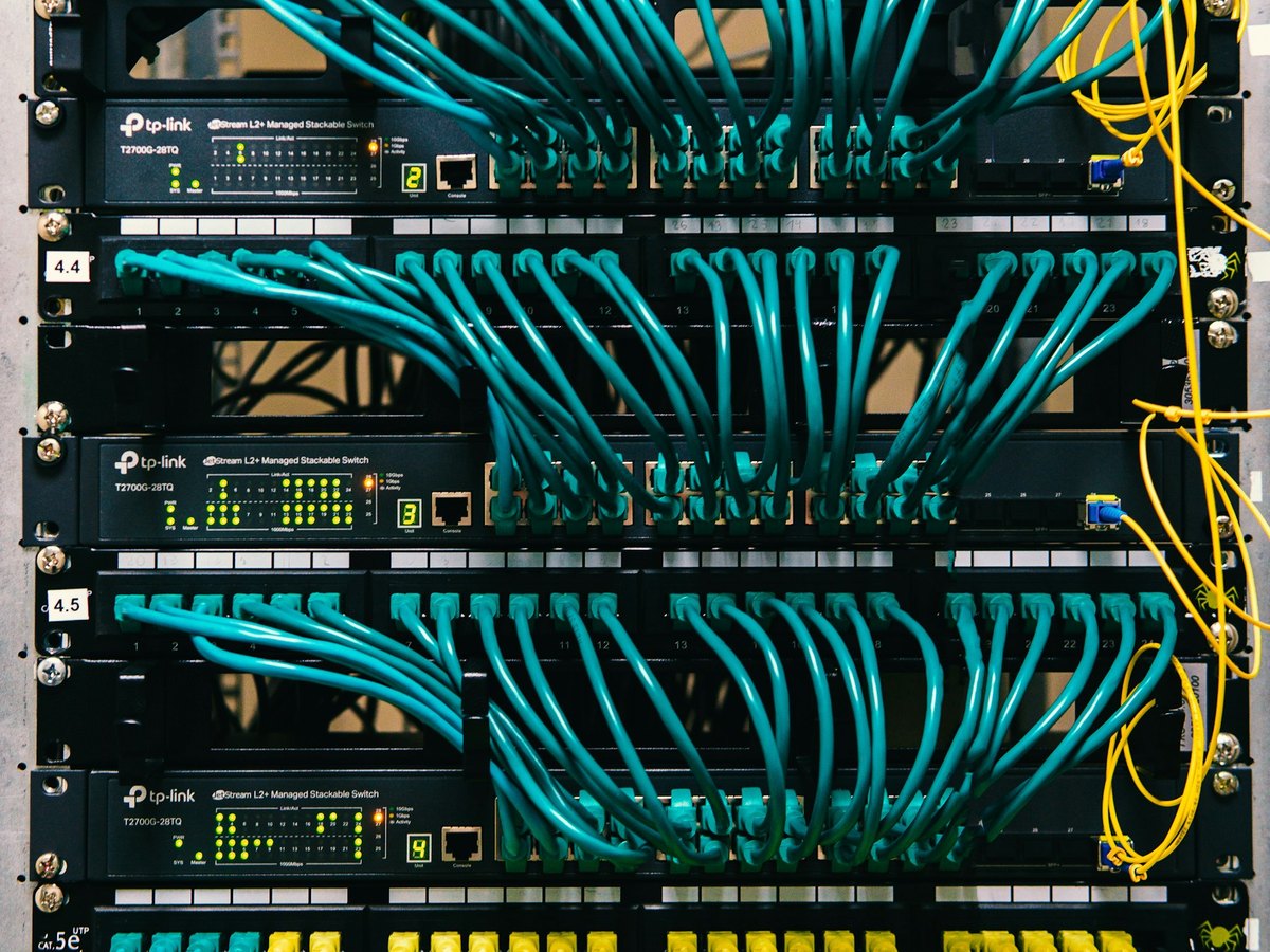 Fiber patching and equipment in a communications rack